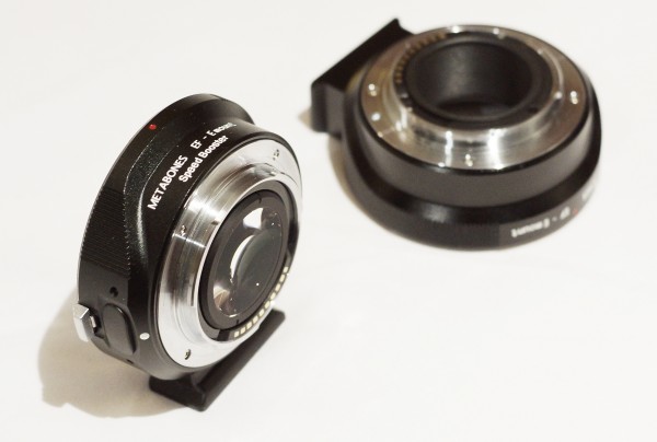 The Metabones Speed Booster Adapter (L) next to a regular Metabones EF to NEX adapter