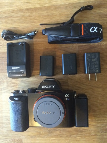 The a7S comes with two batteries and a charger in the box