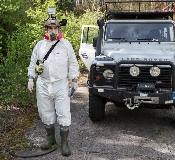 Philip Grossman in protective clothing ready to enter the Bsmt Jupiter Factory