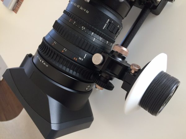 You can use a follow focus but it does tend to slip on the rubber focus ring