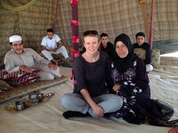 Sharron with Syrian Refugee Noor in yhr Jordan Valley. Building a rapport with your subjects is crucial.